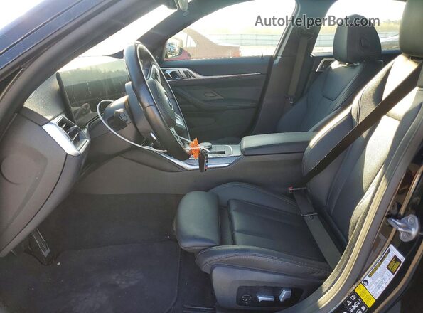 WBA73AV04RFP80063 2024 BMW 4 SERIES Black წინა სალონის ხედი