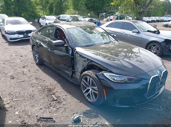 WBA73AV05PFP33301 2023 BMW 4 SERIES Черный Вид спереди