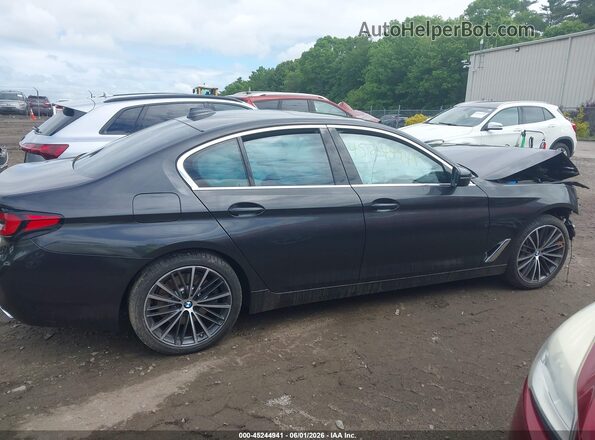 WBA73BJ04PCN29098 2023 BMW 5 SERIES Gray Vista interior trasera