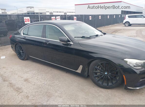 WBA7E2C50GG503948 2016 BMW 7 SERIES Black Widok wnętrza z tyłu