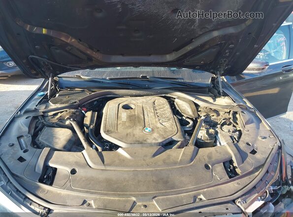 WBA7E2C54GG547712 2016 BMW 7 SERIES Black Rear view