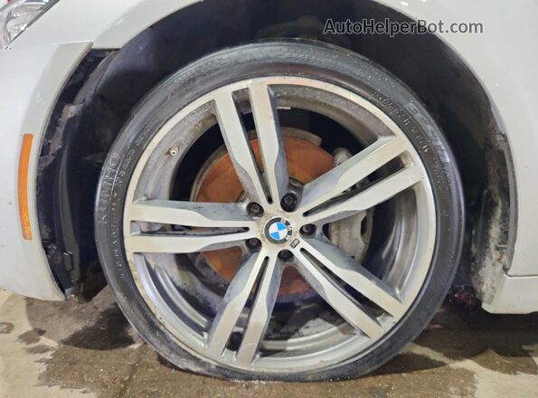 WBA7E2C56KB217513 2019 BMW 7 SERIES Silver VIN կոդի պիտակի տեսք