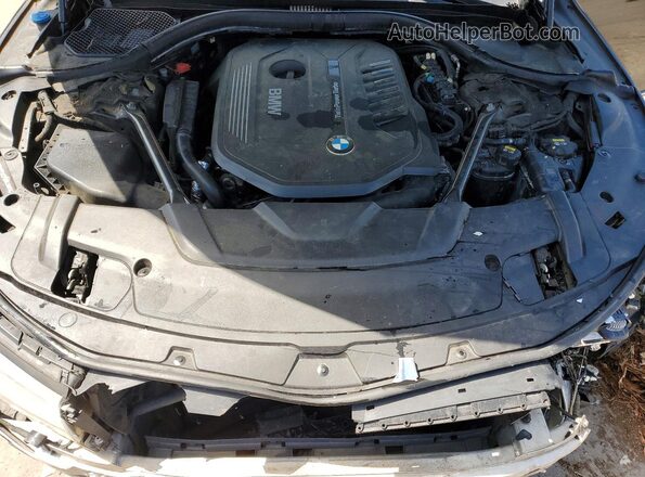 WBA7E4C51HGU99082 2017 BMW 7 SERIES Black Vista interior trasera