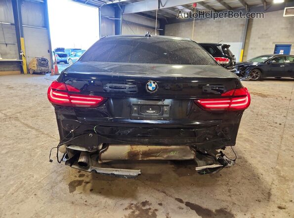 WBA7E4C54KGV28694 2019 BMW 7 SERIES Black Rear view