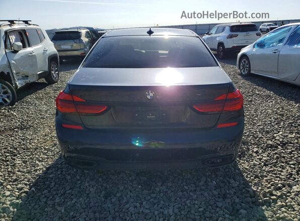WBA7F0C33HGM22122 2017 BMW 7 SERIES Black Vista trasera
