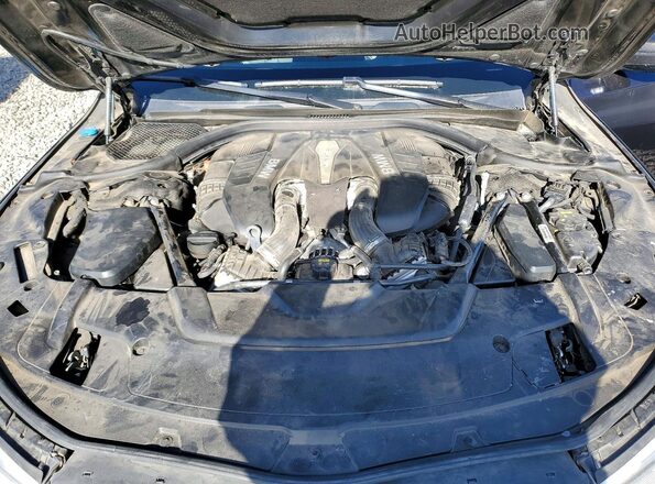 WBA7F0C33HGM22122 2017 BMW 7 SERIES Black Vista interior trasera