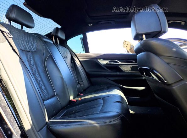 WBA7F0C33HGM22122 2017 BMW 7 SERIES Black Vista de los asientos traseros