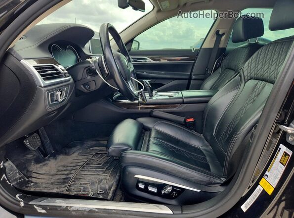 WBA7F0C51GGL99990 2016 BMW 7 SERIES Черный Вид салона спереди
