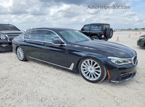 WBA7F0C51GGL99990 2016 BMW 7 SERIES Черный Передняя правая четверть
