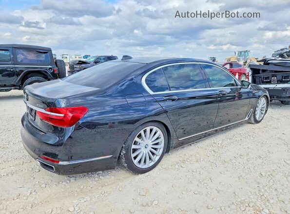 WBA7F0C51GGL99990 2016 BMW 7 SERIES Черный Задняя правая четверть