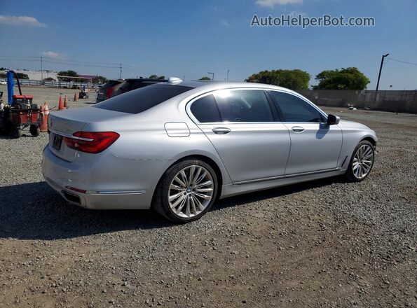 WBA7F0C52HGM21173 2017 BMW 7 SERIES Silver Tył prawy