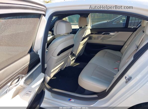 WBA7F0C59GGL99185 2016 BMW 7 SERIES White Вид наклейки з VIN-кодом