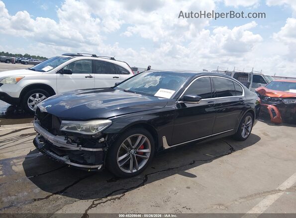 WBA7F2C50GG416788 2016 BMW 7 SERIES Black წინა მარცხენა ხედი სამი მეოთხედიდან