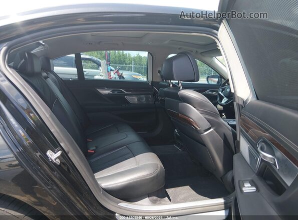 WBA7F2C50GG416788 2016 BMW 7 SERIES Black VIN კოდის სტიკერის ხედი