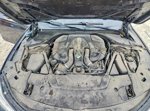 WBA7F2C52GG417229 2016 BMW 7 SERIES Charcoal Vista interior trasera