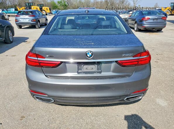 WBA7F2C52GG419580 2016 BMW 7 SERIES Gray Rear view