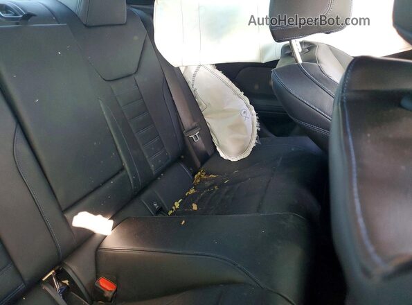 WBA83AP0XNCK23977 2022 BMW M4 Blue Vista de los asientos traseros
