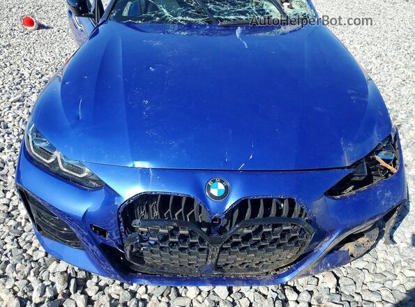 WBA83AP0XNCK23977 2022 BMW M4 Blue Vista interior trasera