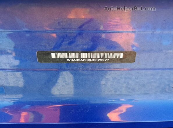 WBA83AP0XNCK23977 2022 BMW M4 Blue Vista del compartimento del motor