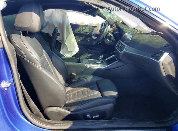 WBA83AP0XNCK23977 2022 BMW M4 Blue Vista interior delantera