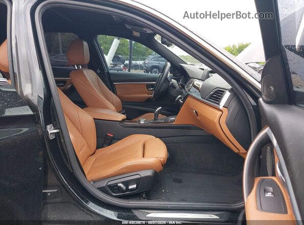 WBA8B3G57GNT62501 2016 BMW 3 SERIES Black Widok wnętrza z przodu
