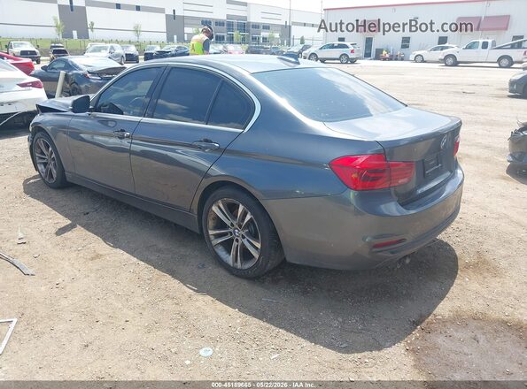 WBA8B9G55JNU96594 2018 BMW 7 SERIES Gray Trasero izquierdo