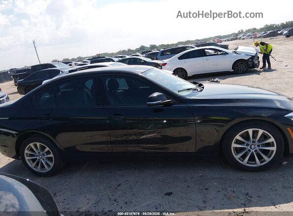 WBA8E5G58JNV03151 2018 BMW 3 SERIES Black Rear interior view