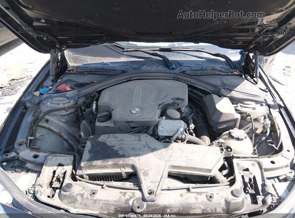 WBA8E5G58JNV03151 2018 BMW 3 SERIES Black Rear view