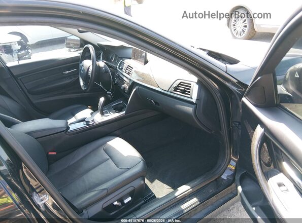 WBA8E5G58JNV03151 2018 BMW 3 SERIES Black Front interior view