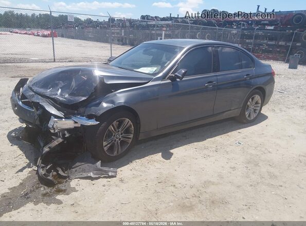 WBA8E9G59GNT47024 2016 BMW 3 SERIES Gray Vista tres cuartos delantera izquierda