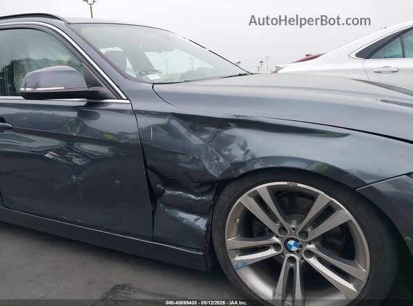 WBA8J1C38HA018566 2017 BMW 7 SERIES Gray Front view