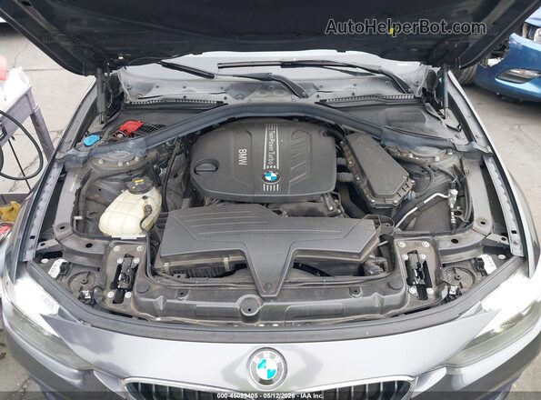 WBA8J1C38HA018566 2017 BMW 7 SERIES Gray Rear view