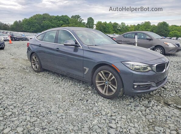 WBA8Z9C52KB220698 2019 BMW 3 SERIES Gray Front right