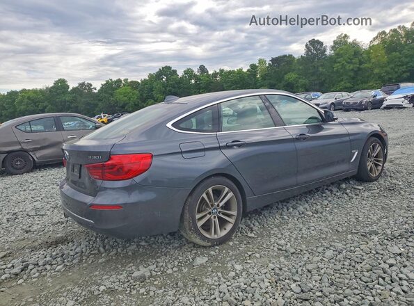 WBA8Z9C52KB220698 2019 BMW 3 SERIES Gray Rear right