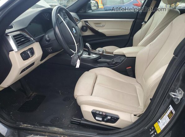 WBA8Z9C52KB220698 2019 BMW 3 SERIES Gray Front interior view