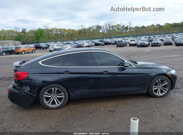 WBA8Z9C53HG452996 2017 BMW 3 SERIES Black Widok wnętrza z tyłu