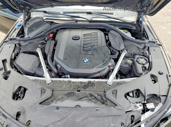 WBADZ2C06PCK62058 2023 BMW 8 SERIES Black Սալոնի հետևի տեսք