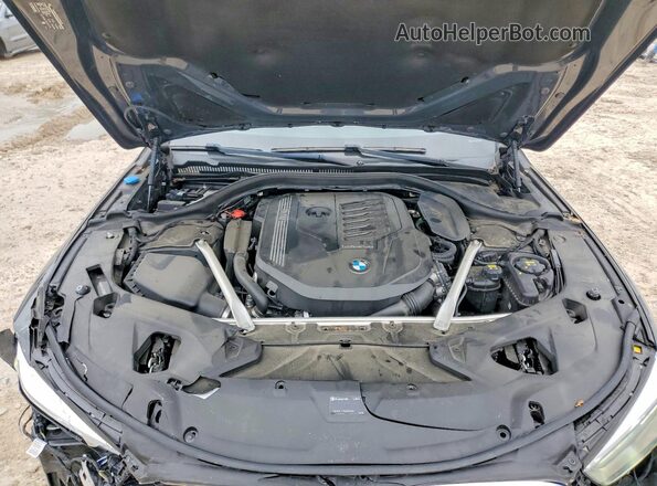 WBAGV2C00NCJ99156 2022 BMW 8 SERIES Charcoal Rear interior view
