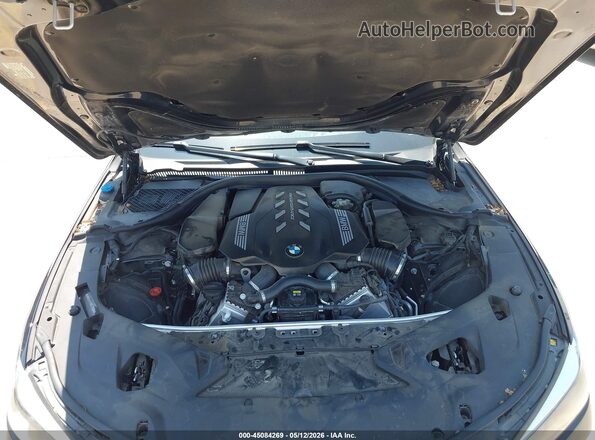 WBAGV8C01NCJ37008 2022 BMW M8 Dark Blue Вид ззаду