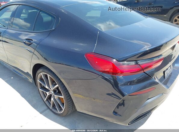 WBAGV8C01NCJ37008 2022 BMW M8 Dark Blue Вид задньої частини салону