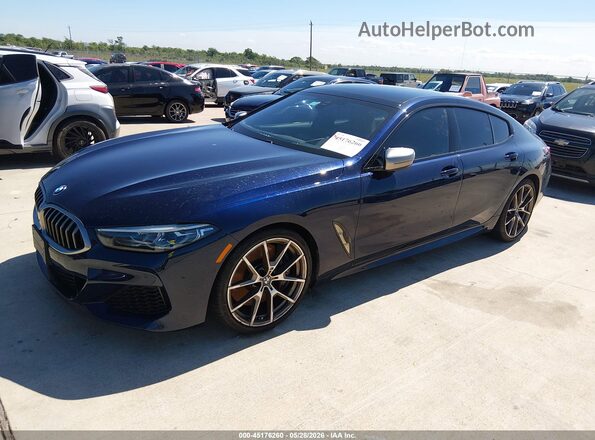 WBAGV8C03LCD76964 2020 BMW M8 Blue წინა მარცხენა ხედი სამი მეოთხედიდან