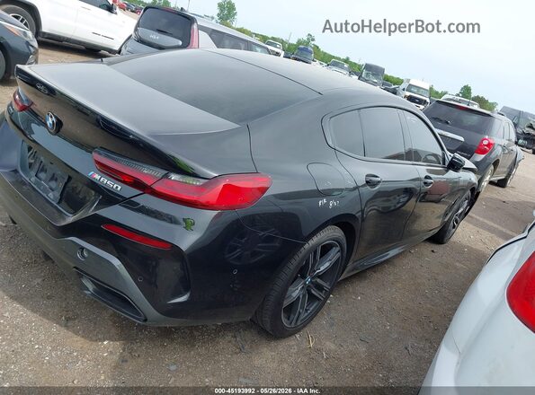 WBAGV8C05NCJ54541 2022 BMW M8 Черный Вид задней части салона