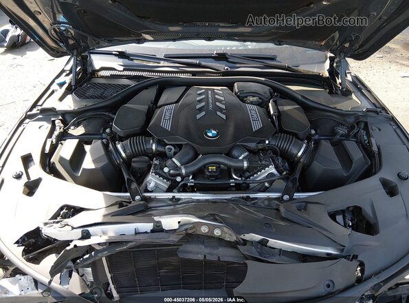 WBAGV8C05PCK65223 2023 BMW M8 Gray Widok z tyłu