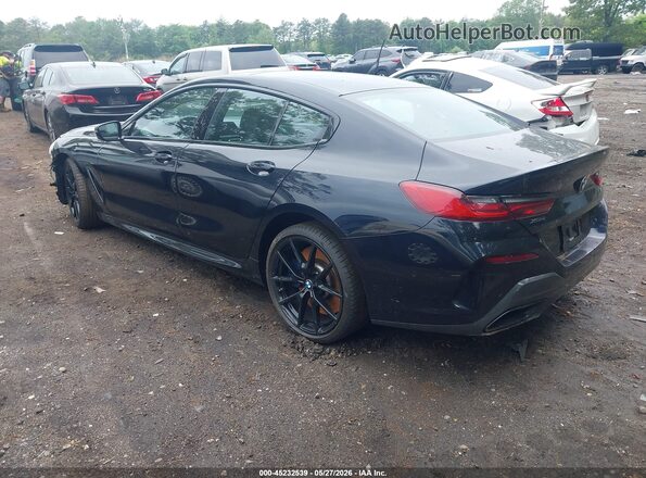 WBAGV8C06NCH89562 2022 BMW M8 Blue Հետևի ձախ