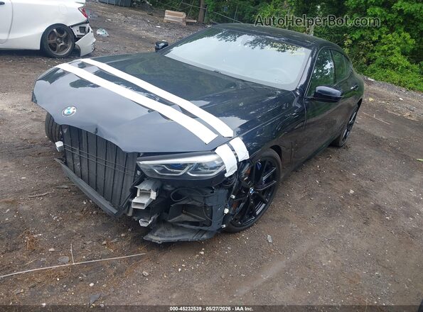 WBAGV8C06NCH89562 2022 BMW M8 Blue Առջևի ձախ երեք քառորդ տեսարան