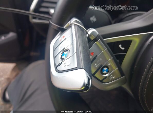 WBAGV8C06NCH89562 2022 BMW M8 Blue Առջևի վահանակի տեսք