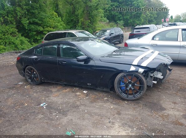 WBAGV8C06NCH89562 2022 BMW M8 Blue Սալոնի հետևի տեսք