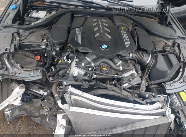 WBAGV8C06NCH89562 2022 BMW M8 Blue Հետևի տեսք