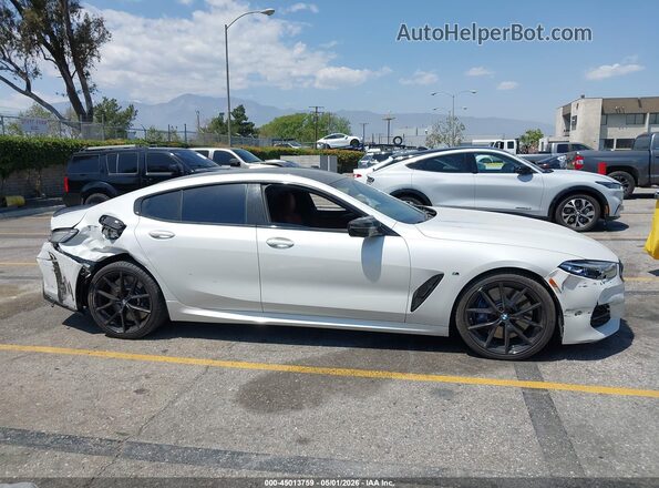 WBAGV8C07LCE44960 2020 BMW M8 Белый Вид задней части салона