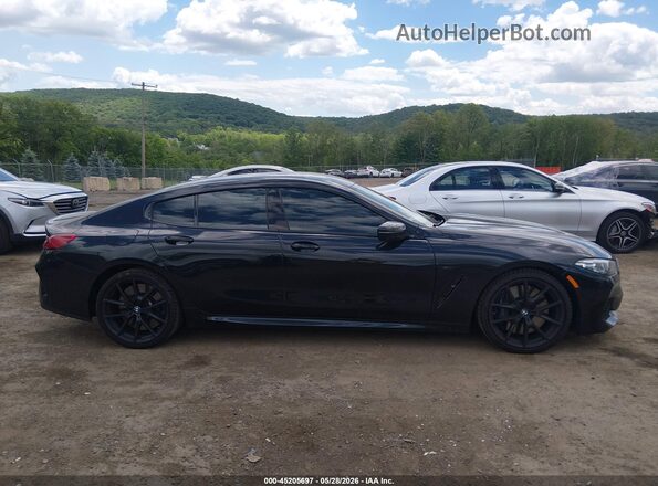 WBAGV8C07NCH75265 2022 BMW M8 Black Вид задньої частини салону